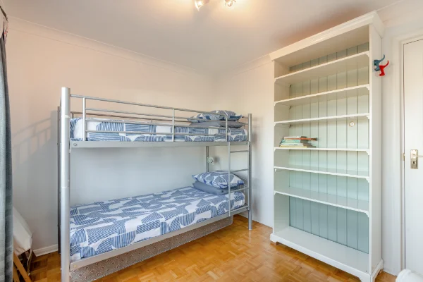 Beach House holiday let in Greatstone, Kent. Twin bedroom with bunk beds.